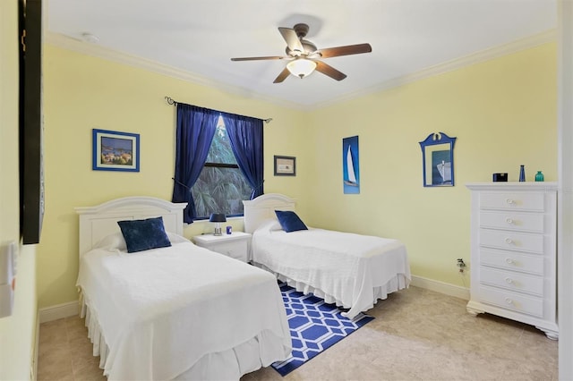 bedroom with ceiling fan and ornamental molding