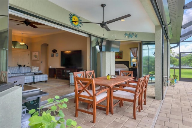 exterior space featuring ceiling fan