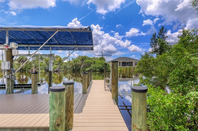 view of dock with a water view