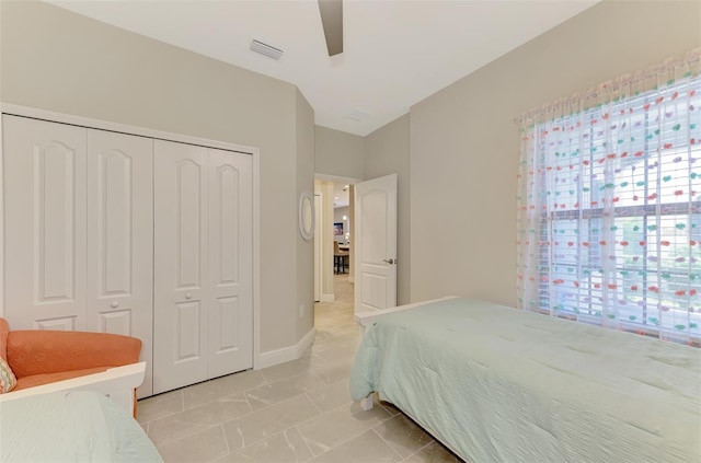 bedroom featuring a closet and ceiling fan