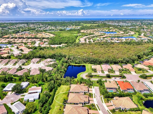 bird's eye view with a water view