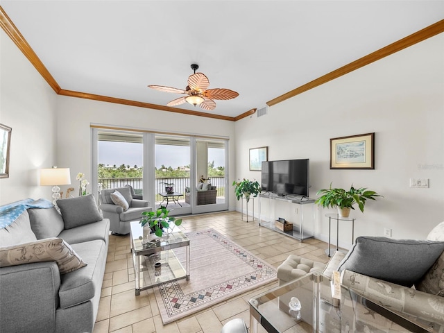 living room with light tile patterned flooring, ornamental molding, and ceiling fan