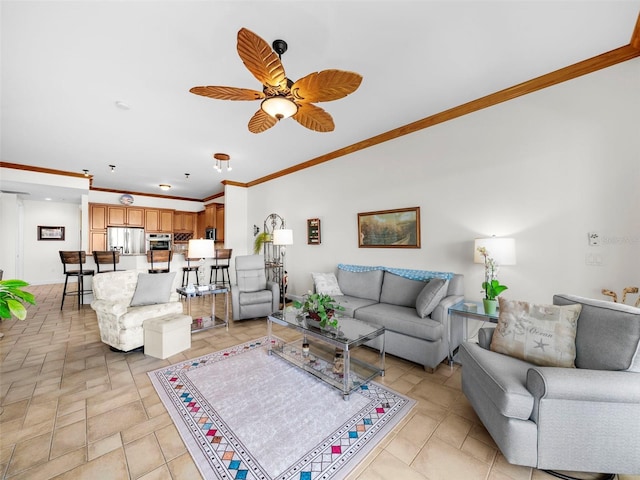 living room featuring ceiling fan and crown molding