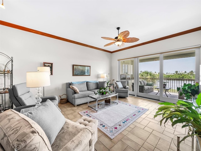 11160 Hacienda Del Mar Blvd Unit D-205, Placida, FL 33946 - living room featuring a water view, ceiling fan, and crown molding