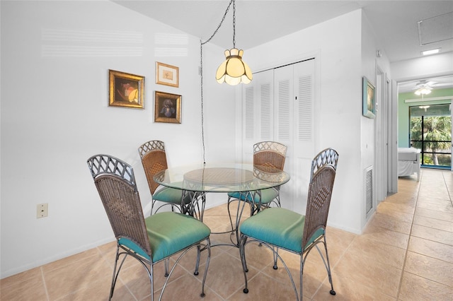 8 Quails Run Blvd Unit 10, Englewood, FL 34223 - dining space with baseboards and light tile patterned floors