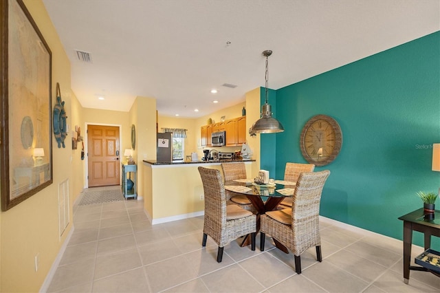 view of tiled dining area