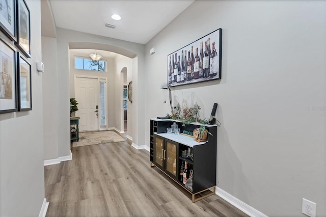 entrance foyer with light wood-type flooring