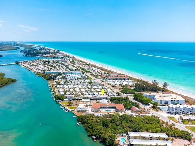 aerial view featuring a water view and a view of the beach