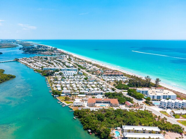 bird's eye view featuring a beach view and a water view