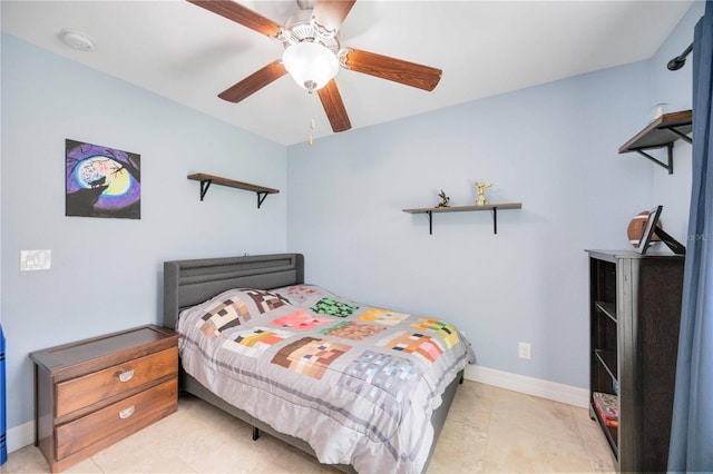 tiled bedroom with ceiling fan