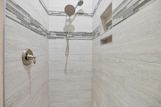 details featuring a tile shower