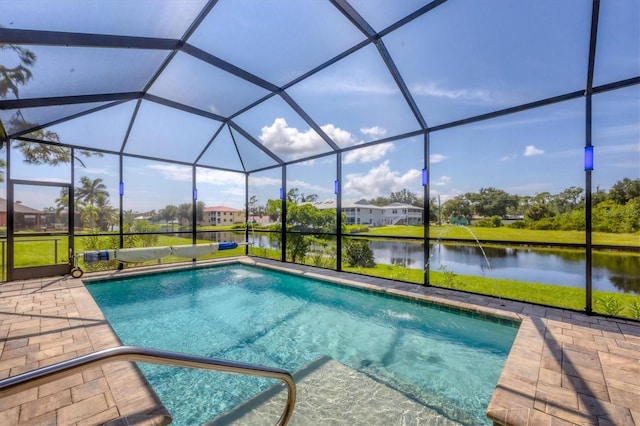 view of pool featuring a patio, a water view, and a lanai