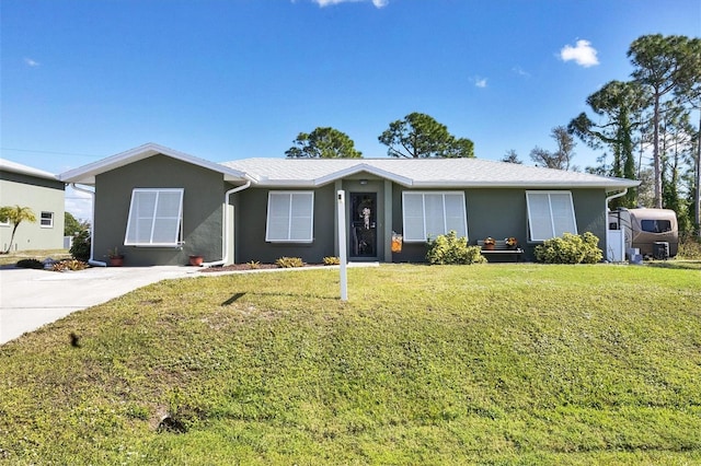 ranch-style home with a front yard