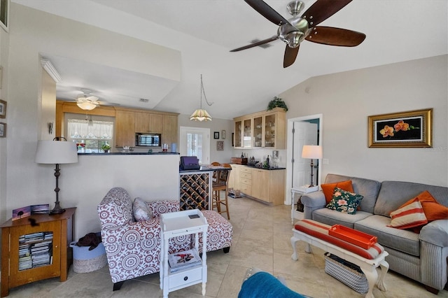 tiled living room with lofted ceiling and ceiling fan