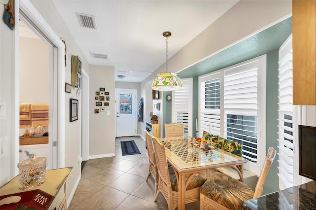 view of tiled dining space