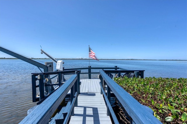 view of dock with a water view