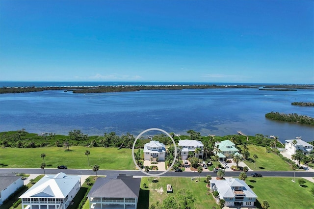 bird's eye view with a water view