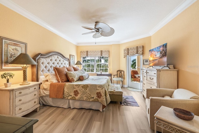 bedroom featuring light wood-type flooring, ceiling fan, and crown molding