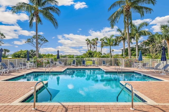 view of swimming pool with a patio area