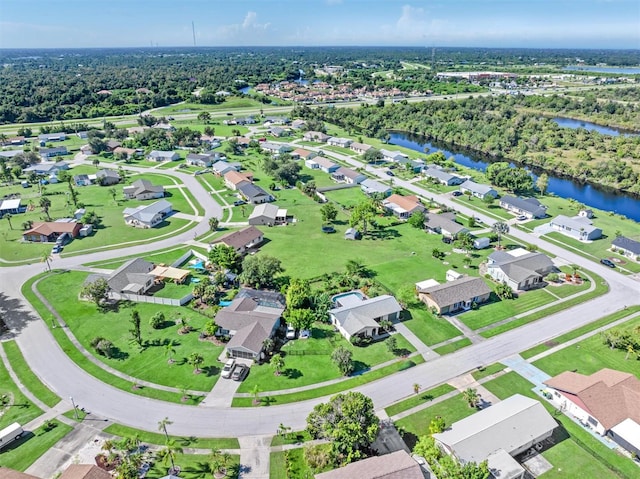 aerial view featuring a residential view and a water view