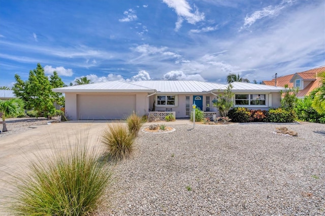 single story home featuring a garage