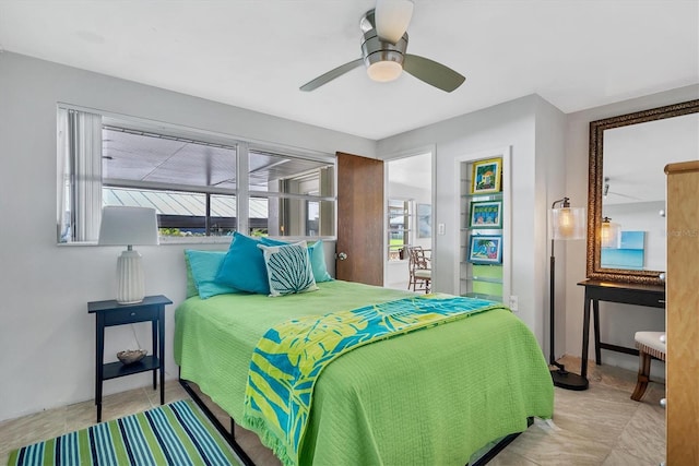 bedroom featuring ceiling fan