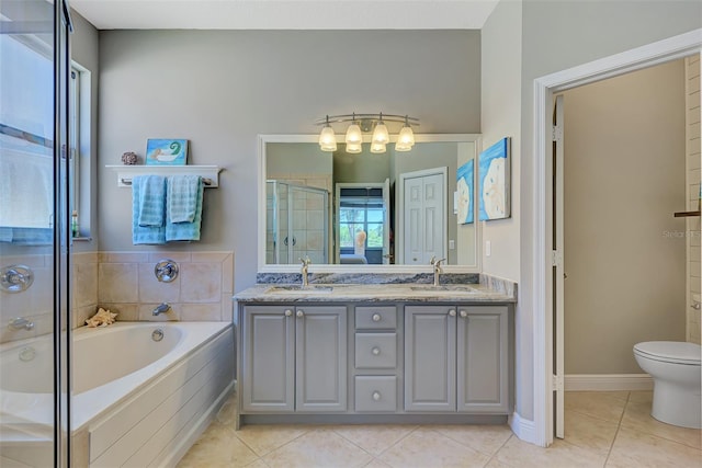 full bathroom with toilet, vanity, separate shower and tub, and tile patterned flooring