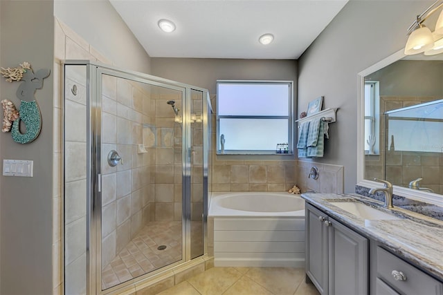 bathroom with vanity, separate shower and tub, and tile patterned flooring