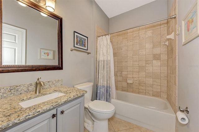 full bathroom with tile patterned floors, shower / bath combo, vanity, and toilet