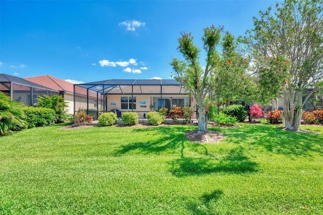 view of yard featuring a lanai