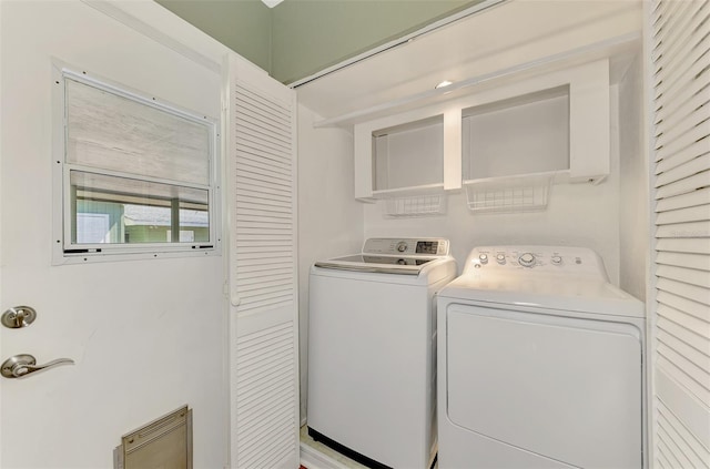 laundry room featuring washer and clothes dryer