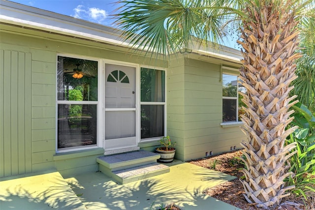 property entrance with a patio area