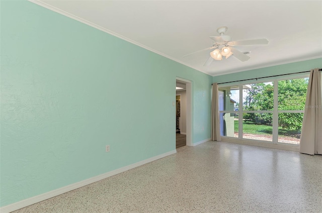 spare room with crown molding and ceiling fan