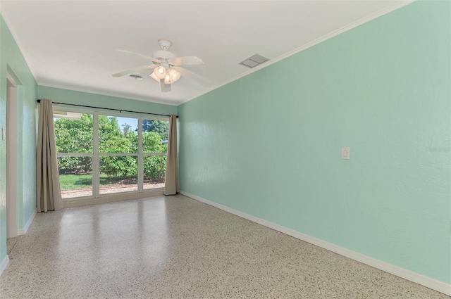 spare room featuring ornamental molding and ceiling fan