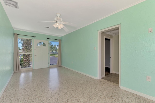 unfurnished room with crown molding and ceiling fan