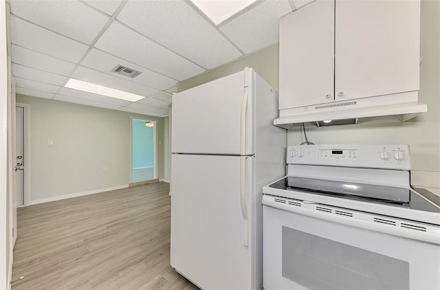 kitchen featuring light hardwood / wood-style flooring, a paneled ceiling, white appliances, and white cabinetry