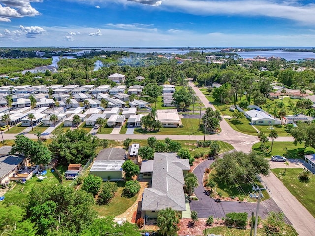 bird's eye view with a water view