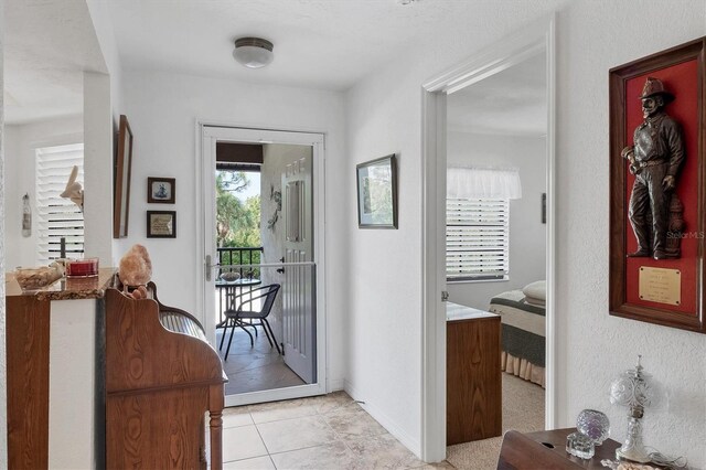 interior space with light tile patterned floors