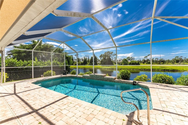 view of pool with a patio, a water view, and a lanai