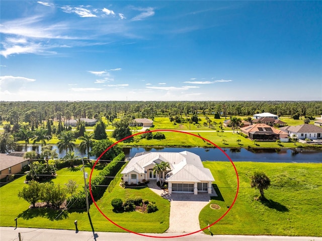 birds eye view of property featuring a water view