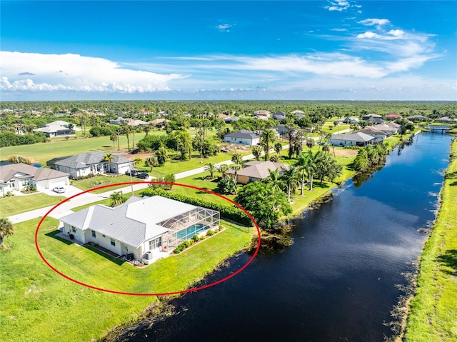 drone / aerial view featuring a water view