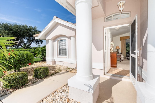 doorway to property with a patio area