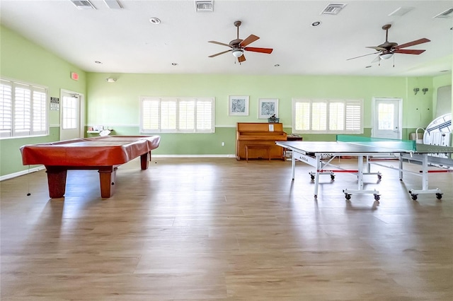 recreation room featuring a wealth of natural light, light hardwood / wood-style floors, ceiling fan, and billiards