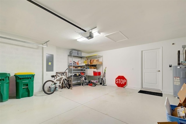 garage featuring a garage door opener, electric panel, and electric water heater