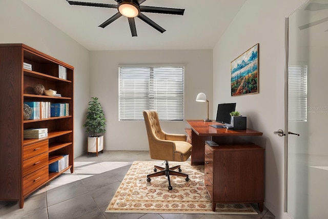 office featuring light tile patterned flooring and ceiling fan