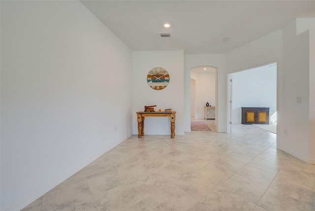 empty room with light tile patterned flooring