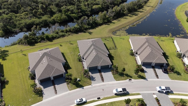 drone / aerial view with a water view