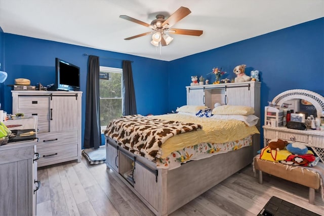 13401 Galveston Ave, Port Charlotte, FL 33981 - bedroom featuring light wood-style flooring and a ceiling fan