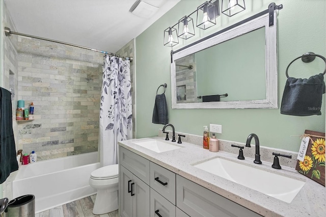 13401 Galveston Ave, Port Charlotte, FL 33981 - full bath featuring toilet, double vanity, shower / tub combo, and wood finished floors