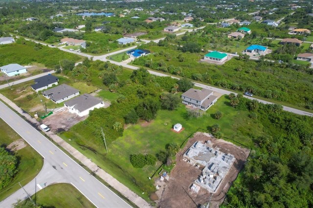 13401 Galveston Ave, Port Charlotte, FL 33981 - aerial view of property and surrounding area with nearby suburban area